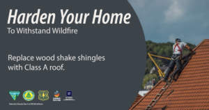 Photo of a roofing professional on a roof with text that says, "Harden your home to withstand wildfire. Replace wood shake shingles with Class A roof."
