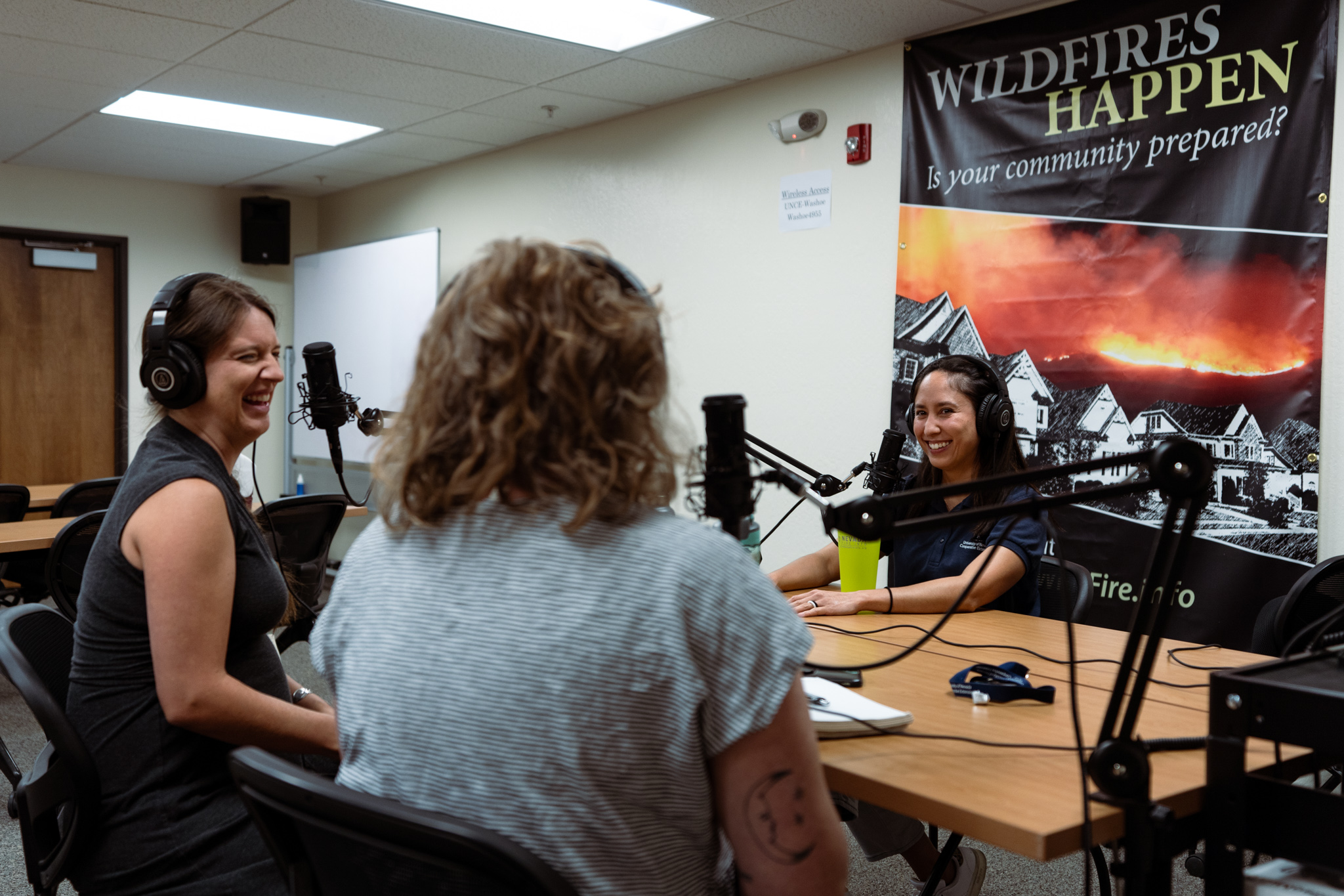 Living With Fire team members (left to right) Megan Kay, Christina Restaino and Jamie Roice-Gomes record the second episode of the new Living With Fire Podcast.